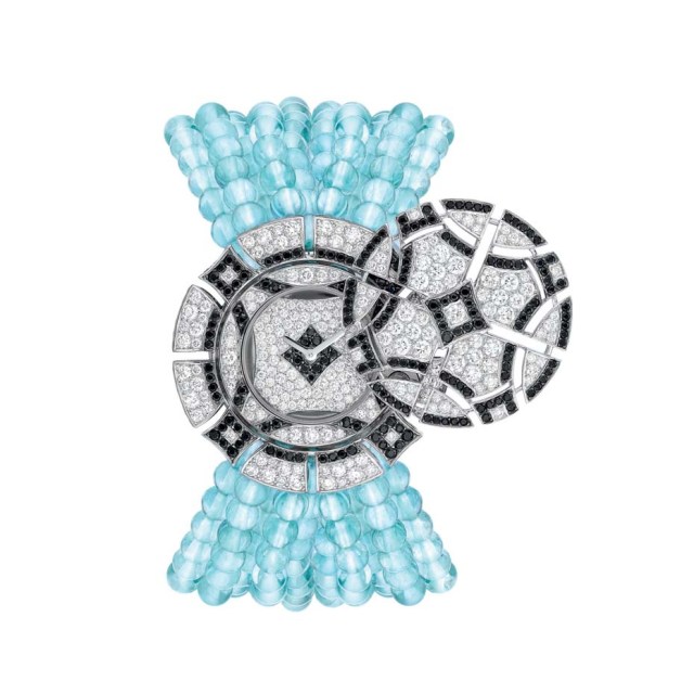 Chanel Café Society Cruise secret watch with an aquamarine bead bracelet contrasted with black spinels and diamonds.